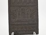 an image of a stone plaque on a stand