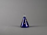 an image of a blue glass candle holder on a grey background