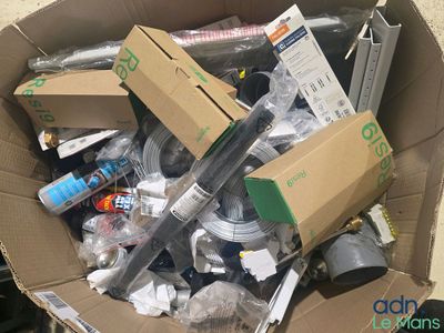 a cardboard box full of various items in it