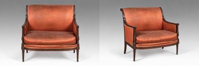 une paire de fauteuils en acajou du début du XXe siècle, dotés d'assises rembourrées