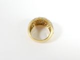 a close up of a gold ring on a white surface