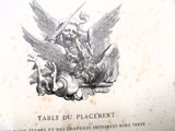un dessin en noir et blanc représentant un ange posé sur une table