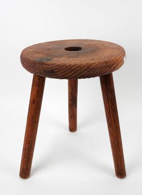an image of a wooden stool with a hole in the middle of it