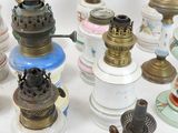 many different types of lamps that are on the table