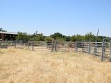 a fence that is in the middle of a field