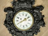 a clock that is hanging on the wall in the room