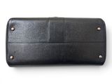 a black leather wallet with rivets and rivets on the front