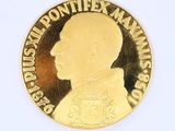 une image représentant une pièce d'or sur laquelle figure le portrait d'un homme