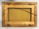 an old picture frame is hanging on a wall next to a flower