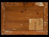 an old picture of a piece of wood with a newspaper on it
