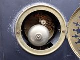 a clock that is sitting on the side of a wall
