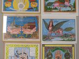 four different pictures of different religious paintings hanging on a wall