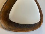 a white plate with a triangle shaped design on it