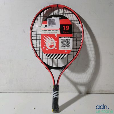 a tennis racket that has a sticker on it