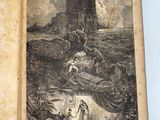 an old book with a picture of a castle in the background