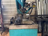a machine that is sitting on a table in a garage