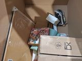 a cardboard box with a lot of items inside of it