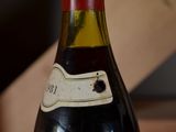 a bottle of wine that is sitting on a table