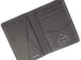 a close up of a wallet on a white background