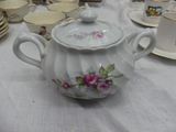 a white table with a white table cloth and a white table cloth with a white table cloth with a white table cloth and a white table cloth with a