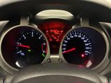 a close up of a car dashboard with a speedometer and gauges