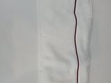 the white towel has a red stripe on the side of it