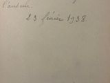 an old book with a handwritten title on it