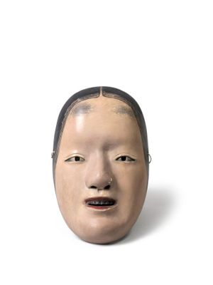 l'image d'un masque représentant un homme sur fond blanc
