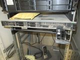 an image of a rack with a bunch of computers
