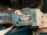 an image of a close up of a drill on a table