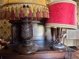 two lamps that are on a table in a room