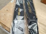 a pair of skis sitting on top of a wooden table