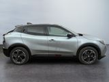 2020 nissan c - hr suv in silver with black rims parked in a parking lot