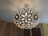a light that is hanging from the ceiling in the room