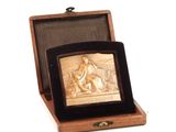 an image of a wooden box with a picture of a man and a woman in it