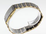 an image of a close up of a watch on a white surface