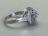 an image of a diamond ring on a table