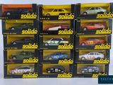 a lot of toy cars that are in a box