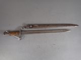 a knife that is laying on top of a table