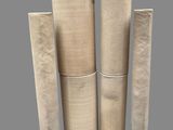 a group of four rolls of paper on top of each other