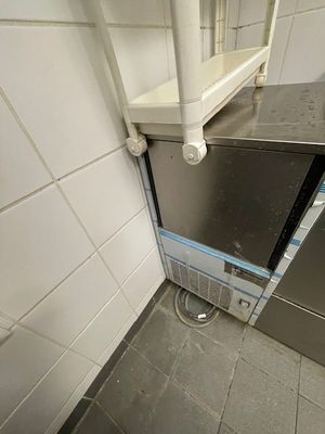 an image of a small kitchen with a microwave in it