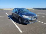 the car is parked in the parking lot in the parking lot