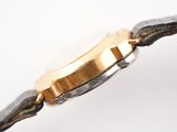 an image of a close up of a watch on a white surface