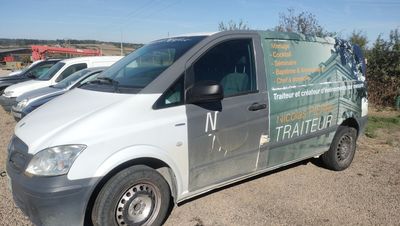 a van that is parked on the side of the road