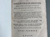 an old book with a black and white title on it