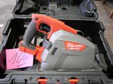 a tool in a case with a sticker on it