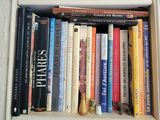 many books that are on a shelf in the room