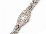 a lady ' s diamond set bracelet watch, by cartier