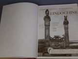 an open book with a picture of a statue on it
