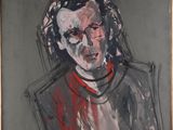 portrait d'un homme portant une chemise rouge et une chemise noire et blanche